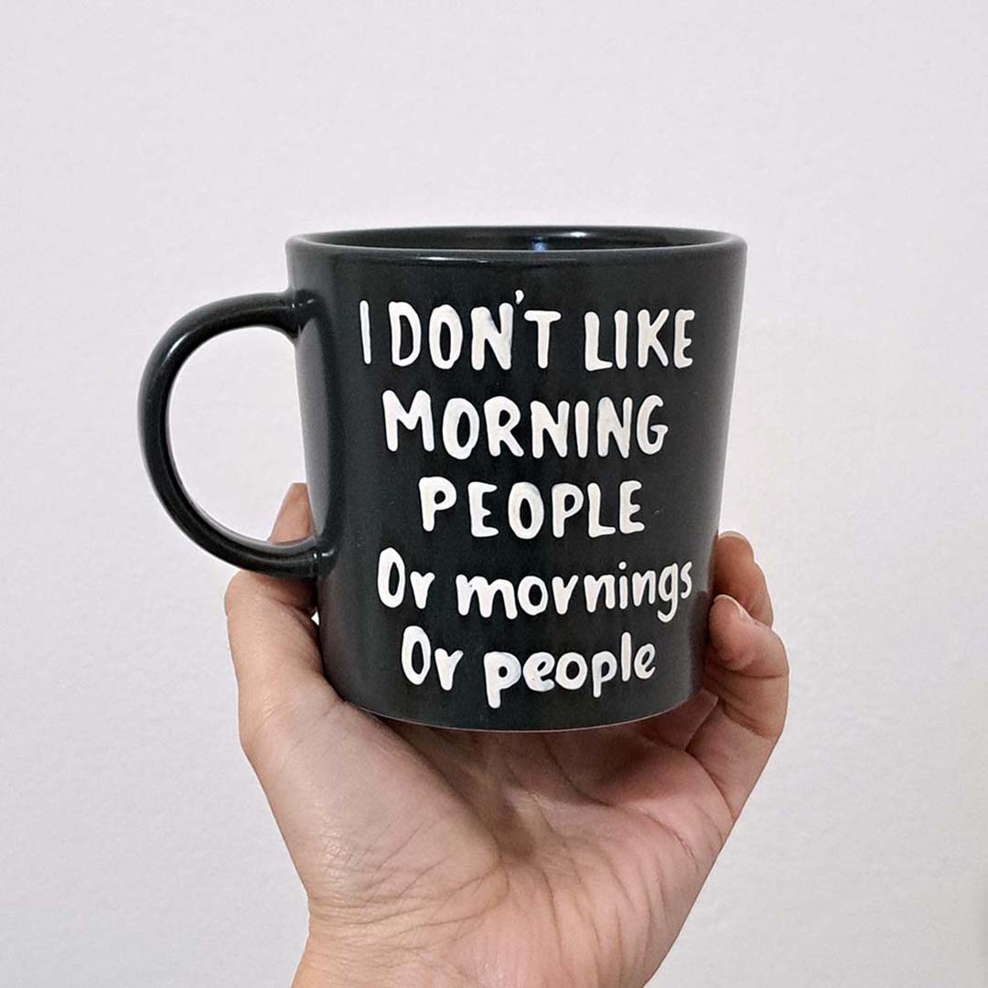 Hand painted black ceramic mug, "I don't like morning people"